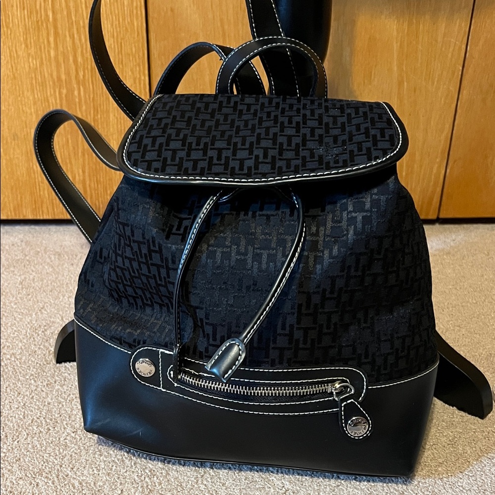 EUCTommy Hilfiger backpack purse, black. Was purchased and put in a closet.
